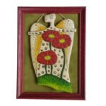 Angelas iš šamotinio molio rėmelyje