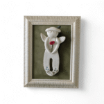 Įrėmintas keramikinis angeliukas